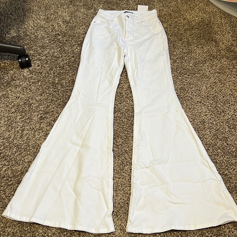 Fashion Nova white super wide flare jeans. NWT